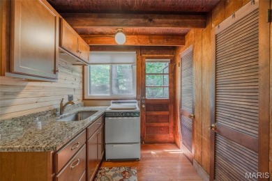 Close to the beach AND tucked away on 3.67 acres this adorable on Innsbrook Resort Golf Course in Missouri - for sale on GolfHomes.com, golf home, golf lot