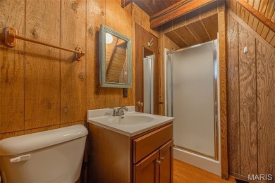Close to the beach AND tucked away on 3.67 acres this adorable on Innsbrook Resort Golf Course in Missouri - for sale on GolfHomes.com, golf home, golf lot