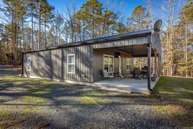 Looking for a Lake House or full time home with low maintenance on  in Arkansas - for sale on GolfHomes.com, golf home, golf lot