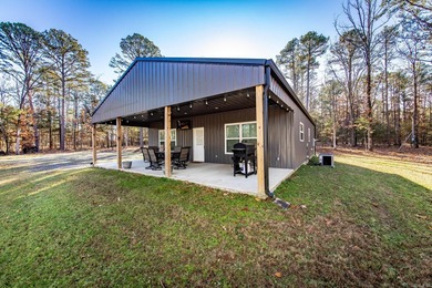 Looking for a Lake House or full time home with low maintenance on  in Arkansas - for sale on GolfHomes.com, golf home, golf lot