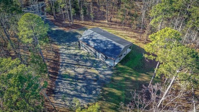 Looking for a Lake House or full time home with low maintenance on  in Arkansas - for sale on GolfHomes.com, golf home, golf lot