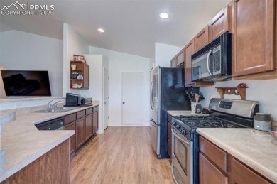 Don't miss this spacious ranch style family home in Pueblo West on Desert Hawk At Pueblo West in Colorado - for sale on GolfHomes.com, golf home, golf lot