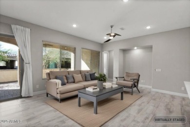 Experience luxury living in this impeccable 2-bedroom PLUS DEN on Tuscany Falls At Pebble Creek in Arizona - for sale on GolfHomes.com, golf home, golf lot