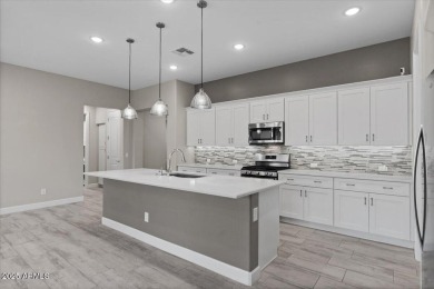 Experience luxury living in this impeccable 2-bedroom PLUS DEN on Tuscany Falls At Pebble Creek in Arizona - for sale on GolfHomes.com, golf home, golf lot