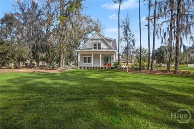 An elegant new construction carriage house offering refined on The Ford Field and River Club  in Georgia - for sale on GolfHomes.com, golf home, golf lot