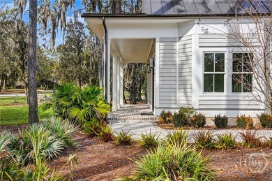 An elegant new construction carriage house offering refined on The Ford Field and River Club  in Georgia - for sale on GolfHomes.com, golf home, golf lot
