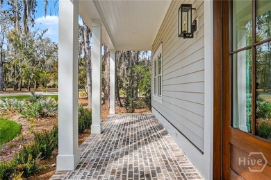 An elegant new construction carriage house offering refined on The Ford Field and River Club  in Georgia - for sale on GolfHomes.com, golf home, golf lot