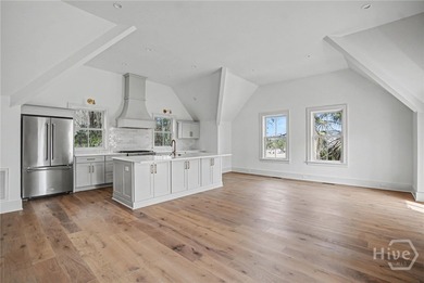 An elegant new construction carriage house offering refined on The Ford Field and River Club  in Georgia - for sale on GolfHomes.com, golf home, golf lot