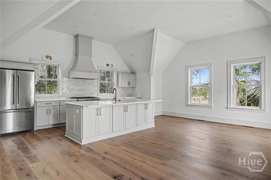 An elegant new construction carriage house offering refined on The Ford Field and River Club  in Georgia - for sale on GolfHomes.com, golf home, golf lot