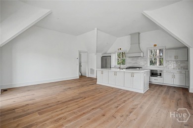 An elegant new construction carriage house offering refined on The Ford Field and River Club  in Georgia - for sale on GolfHomes.com, golf home, golf lot