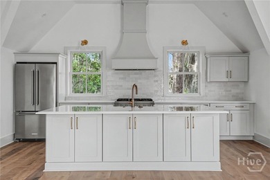 An elegant new construction carriage house offering refined on The Ford Field and River Club  in Georgia - for sale on GolfHomes.com, golf home, golf lot