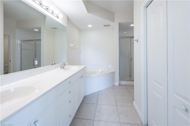 Experience the best of Naples living in this beautifully on Pelican Marsh Golf Club in Florida - for sale on GolfHomes.com, golf home, golf lot