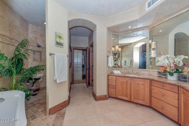 This exceptional 3-bedroom, 3-bath golf course property in on Gainey Ranch Golf Club in Arizona - for sale on GolfHomes.com, golf home, golf lot