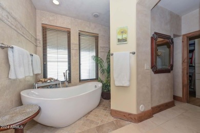 This exceptional 3-bedroom, 3-bath golf course property in on Gainey Ranch Golf Club in Arizona - for sale on GolfHomes.com, golf home, golf lot