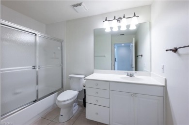 Experience the best of Naples living in this beautifully on Pelican Marsh Golf Club in Florida - for sale on GolfHomes.com, golf home, golf lot