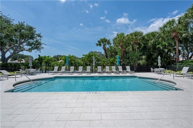 Experience the best of Naples living in this beautifully on Pelican Marsh Golf Club in Florida - for sale on GolfHomes.com, golf home, golf lot