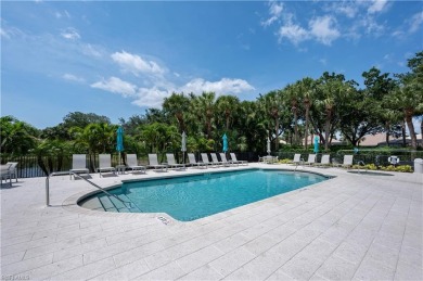 Experience the best of Naples living in this beautifully on Pelican Marsh Golf Club in Florida - for sale on GolfHomes.com, golf home, golf lot