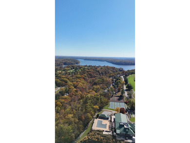 Escape to lakeside living at The Pointe with this inviting on The Eagle Pointe Golf Resort in Indiana - for sale on GolfHomes.com, golf home, golf lot