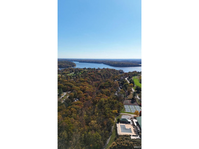 Escape to lakeside living at The Pointe with this inviting on The Eagle Pointe Golf Resort in Indiana - for sale on GolfHomes.com, golf home, golf lot