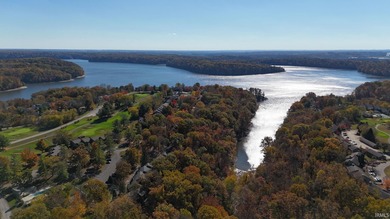 Escape to lakeside living at The Pointe with this inviting on The Eagle Pointe Golf Resort in Indiana - for sale on GolfHomes.com, golf home, golf lot