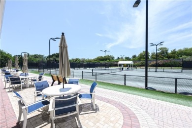 Experience the best of Naples living in this beautifully on Pelican Marsh Golf Club in Florida - for sale on GolfHomes.com, golf home, golf lot