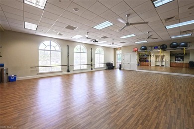 Experience the best of Naples living in this beautifully on Pelican Marsh Golf Club in Florida - for sale on GolfHomes.com, golf home, golf lot