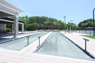 Experience the best of Naples living in this beautifully on Pelican Marsh Golf Club in Florida - for sale on GolfHomes.com, golf home, golf lot