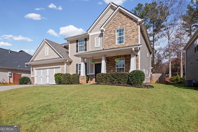 BEAUTIFUL AND SPACIOUS 5 BR HOME IN CHOICE SUMMERGROVE COMMUNITY on Summergrove Golf Club in Georgia - for sale on GolfHomes.com, golf home, golf lot