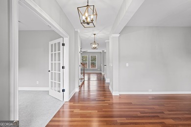 BEAUTIFUL AND SPACIOUS 5 BR HOME IN CHOICE SUMMERGROVE COMMUNITY on Summergrove Golf Club in Georgia - for sale on GolfHomes.com, golf home, golf lot