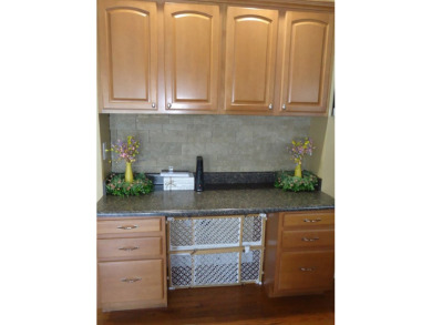 Welcome to this spacious and inviting 4-bedroom, 2.5-bath home on Paintsville Country Club in Kentucky - for sale on GolfHomes.com, golf home, golf lot