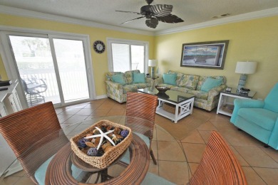 Experience coastal living at its finest in this beautifully on Sandpiper Cove Golf Course in Florida - for sale on GolfHomes.com, golf home, golf lot