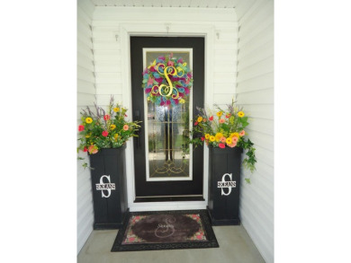 Welcome to this spacious and inviting 4-bedroom, 2.5-bath home on Paintsville Country Club in Kentucky - for sale on GolfHomes.com, golf home, golf lot