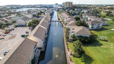 Experience coastal living at its finest in this beautifully on Sandpiper Cove Golf Course in Florida - for sale on GolfHomes.com, golf home, golf lot