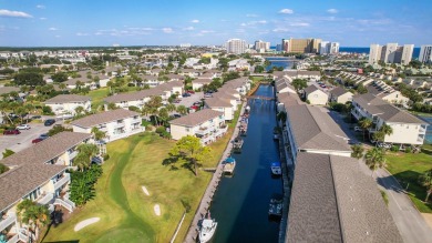 Experience coastal living at its finest in this beautifully on Sandpiper Cove Golf Course in Florida - for sale on GolfHomes.com, golf home, golf lot