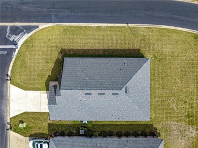 EXPECT TO BE IMPRESSED WITH THIS BETTER THAN NEW HOME IN A GATED on Country Club At Silver Springs Shores in Florida - for sale on GolfHomes.com, golf home, golf lot