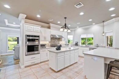 A lakeside oasis with expansive golf course views.  Over half an on Rockport Country Club in Texas - for sale on GolfHomes.com, golf home, golf lot