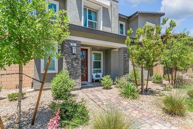 Nestled within a picturesque embrace of a serene lake and golf on Reflection Bay Golf Club in Nevada - for sale on GolfHomes.com, golf home, golf lot