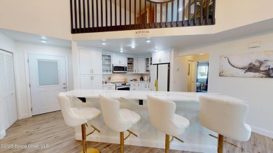 Discover luxury meets nature in this turnkey fully furnished on The Great Outdoors Golf and Country Club in Florida - for sale on GolfHomes.com, golf home, golf lot