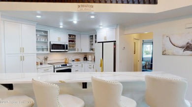 Discover luxury meets nature in this turnkey fully furnished on The Great Outdoors Golf and Country Club in Florida - for sale on GolfHomes.com, golf home, golf lot