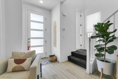 Nestled within a picturesque embrace of a serene lake and golf on Reflection Bay Golf Club in Nevada - for sale on GolfHomes.com, golf home, golf lot