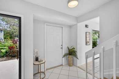 Beautifully maintained townhome nestled within the PRESTIGIOUS on PGA National Golf Club in Florida - for sale on GolfHomes.com, golf home, golf lot