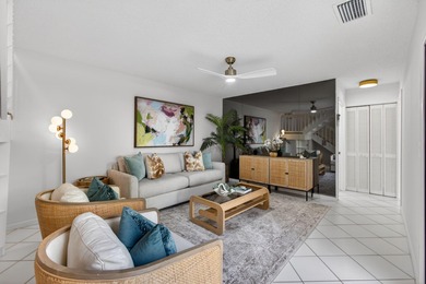 Beautifully maintained townhome nestled within the PRESTIGIOUS on PGA National Golf Club in Florida - for sale on GolfHomes.com, golf home, golf lot