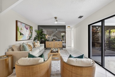 Beautifully maintained townhome nestled within the PRESTIGIOUS on PGA National Golf Club in Florida - for sale on GolfHomes.com, golf home, golf lot