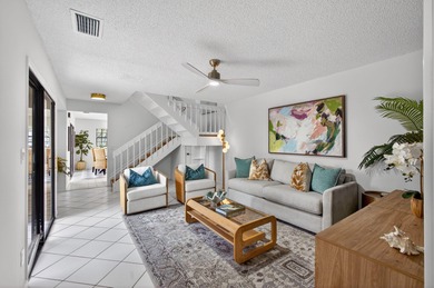 Beautifully maintained townhome nestled within the PRESTIGIOUS on PGA National Golf Club in Florida - for sale on GolfHomes.com, golf home, golf lot