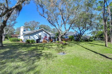 Nestled in the prestigious gated community of River Hills, this on River Hills Country Club in Florida - for sale on GolfHomes.com, golf home, golf lot