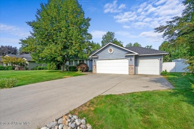 SINGLE-LEVEL  HOME IN HAYDEN'S WOODLAND MEADOWS. Woodland on Hayden Lake Country Club in Idaho - for sale on GolfHomes.com, golf home, golf lot