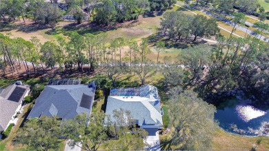 Nestled in the prestigious gated community of River Hills, this on River Hills Country Club in Florida - for sale on GolfHomes.com, golf home, golf lot