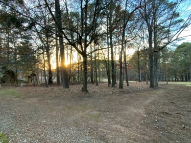 Undeveloped lot in Reynolds Great Waters on and overlooking the on Great Waters Course At Reynolds Plantation in Georgia - for sale on GolfHomes.com, golf home, golf lot