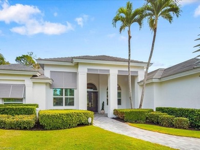 Gracefully positioned on an exceptionally private preserve on Bay Colony Golf Club in Florida - for sale on GolfHomes.com, golf home, golf lot