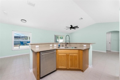 Welcome to this beautifully updated 3-bed, 2-bath pool home with on Duffys Golf Center in Florida - for sale on GolfHomes.com, golf home, golf lot
